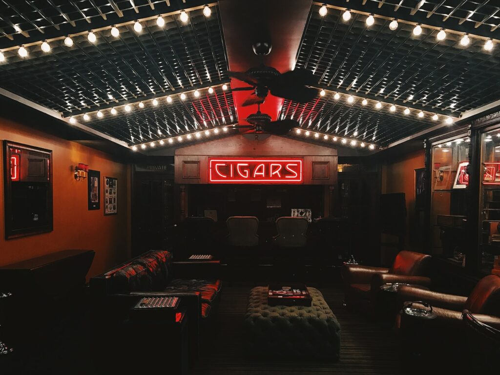 疫情2年後,酒店產業的實際狀況 17 red cigars neon signage in the middle of brown room